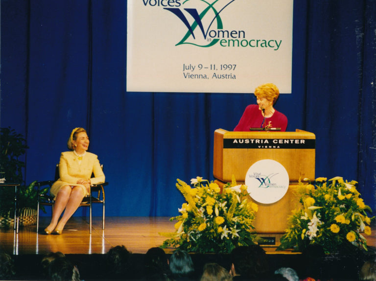 Hillary Clinton and Swanee Hunt onstage together at the Vital Voices conference, Austria, 1997.